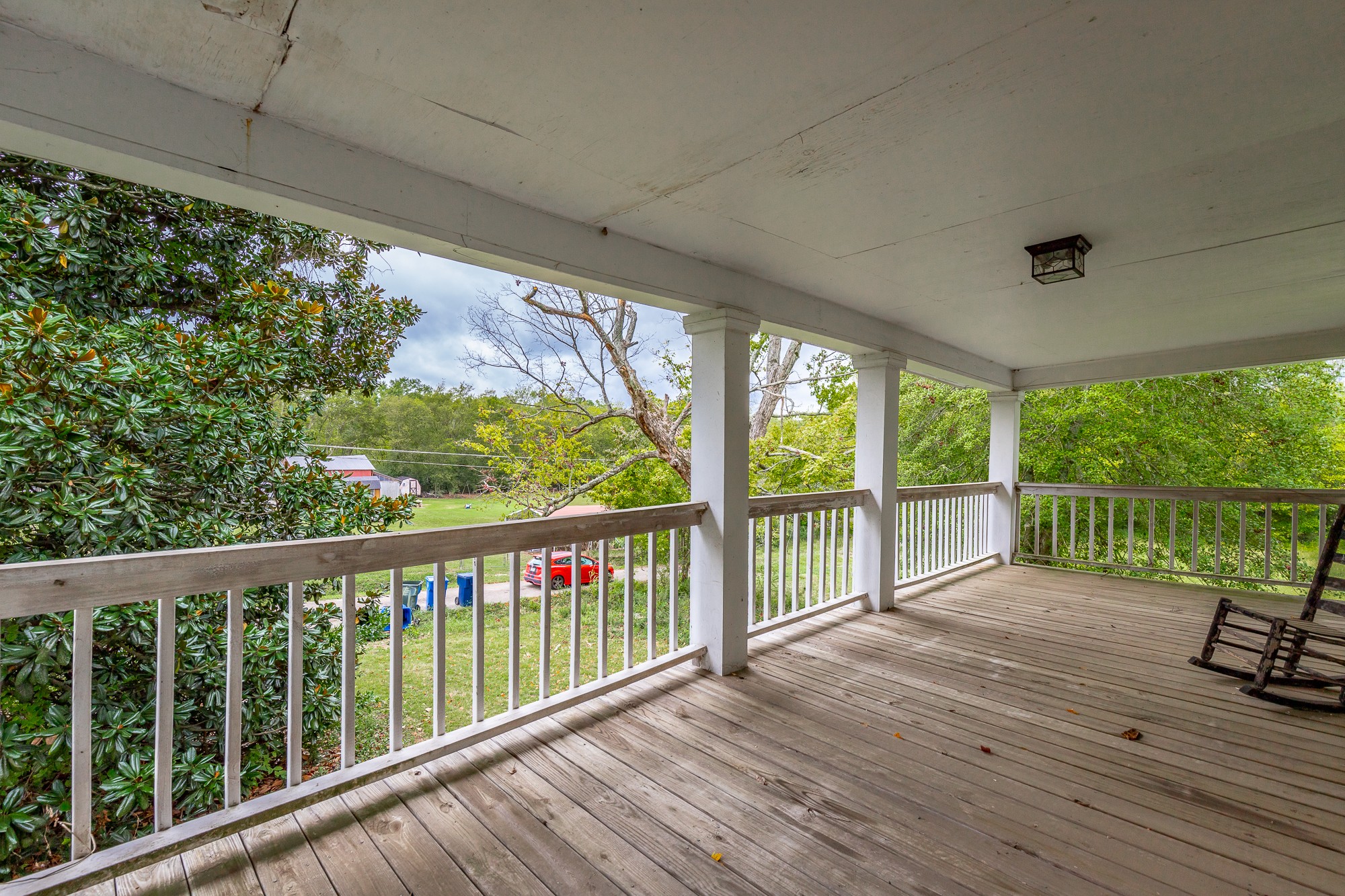 2419 Maple Street Chattanooga, TN 37406 - Photo 7 of 32 a view of a porch with wooden floor and yard