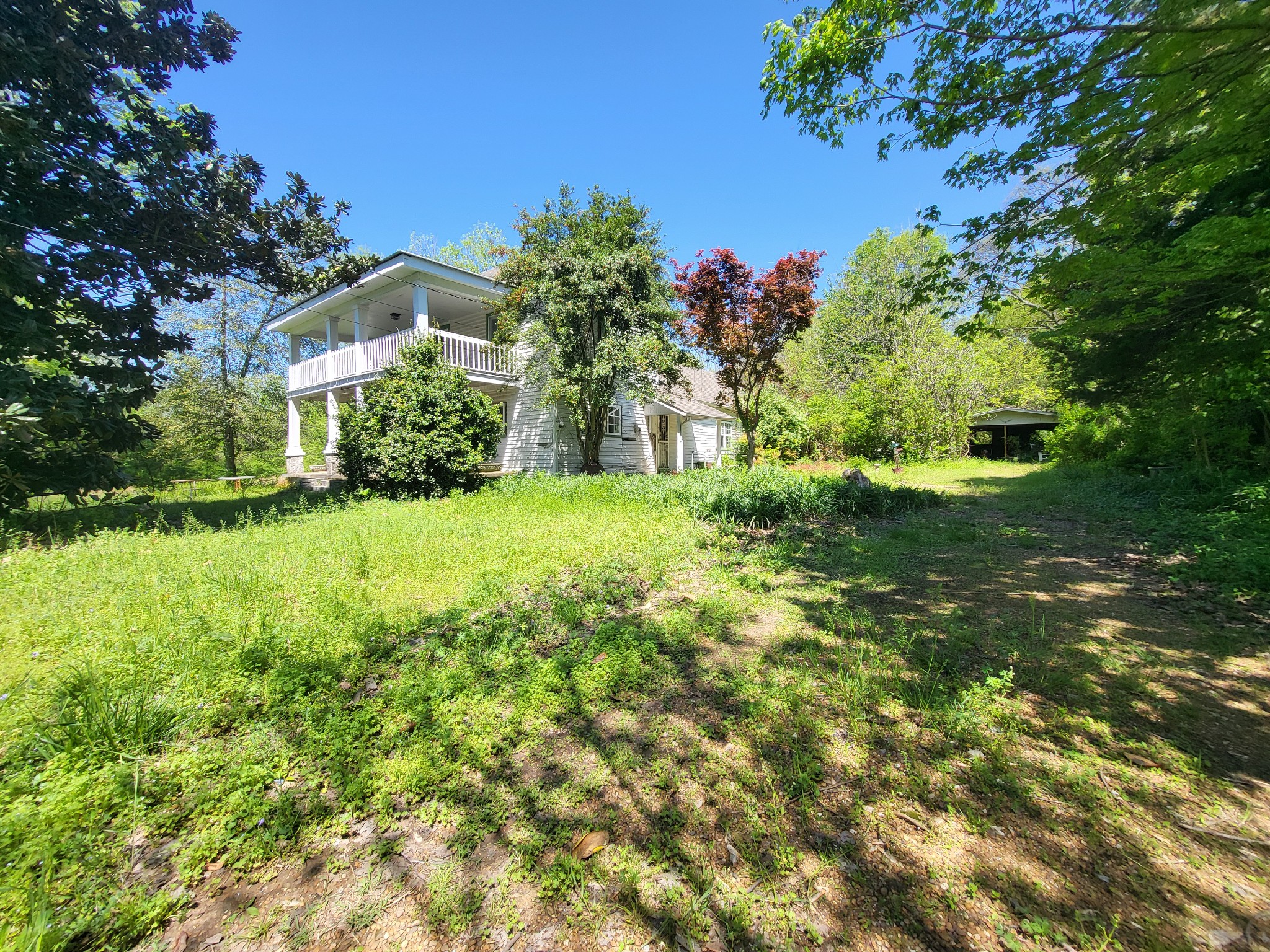 2419 Maple Street Chattanooga, TN 37406 - Photo 9 of 32 a view of a garden with a building in the background