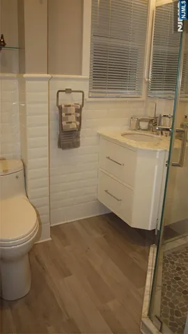 a bathroom with a sink and toilet