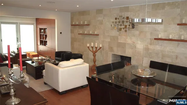 a living room with furniture and a table