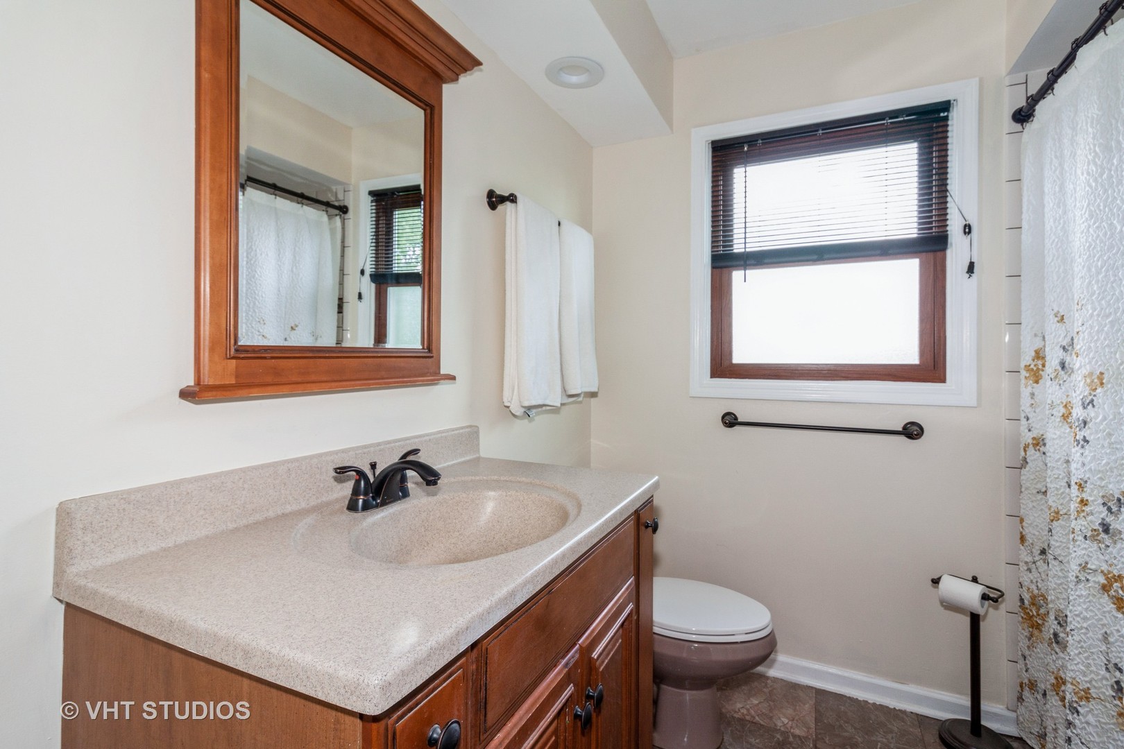 3523 Ronald Road Crete, IL 60417 - Photo 14 of 20 a bathroom with a sink toilet and a mirror