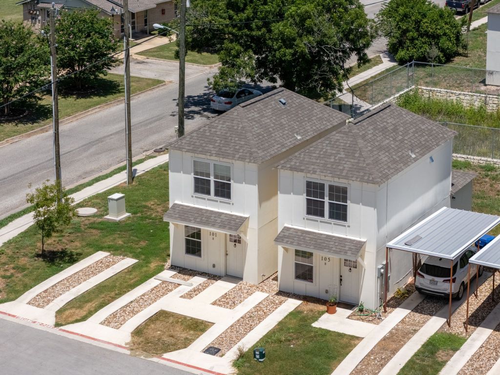 230 Debus Drive, Unit 101B Taylor, TX 76574 - Photo 4 of 15 a view of a yard in front of house