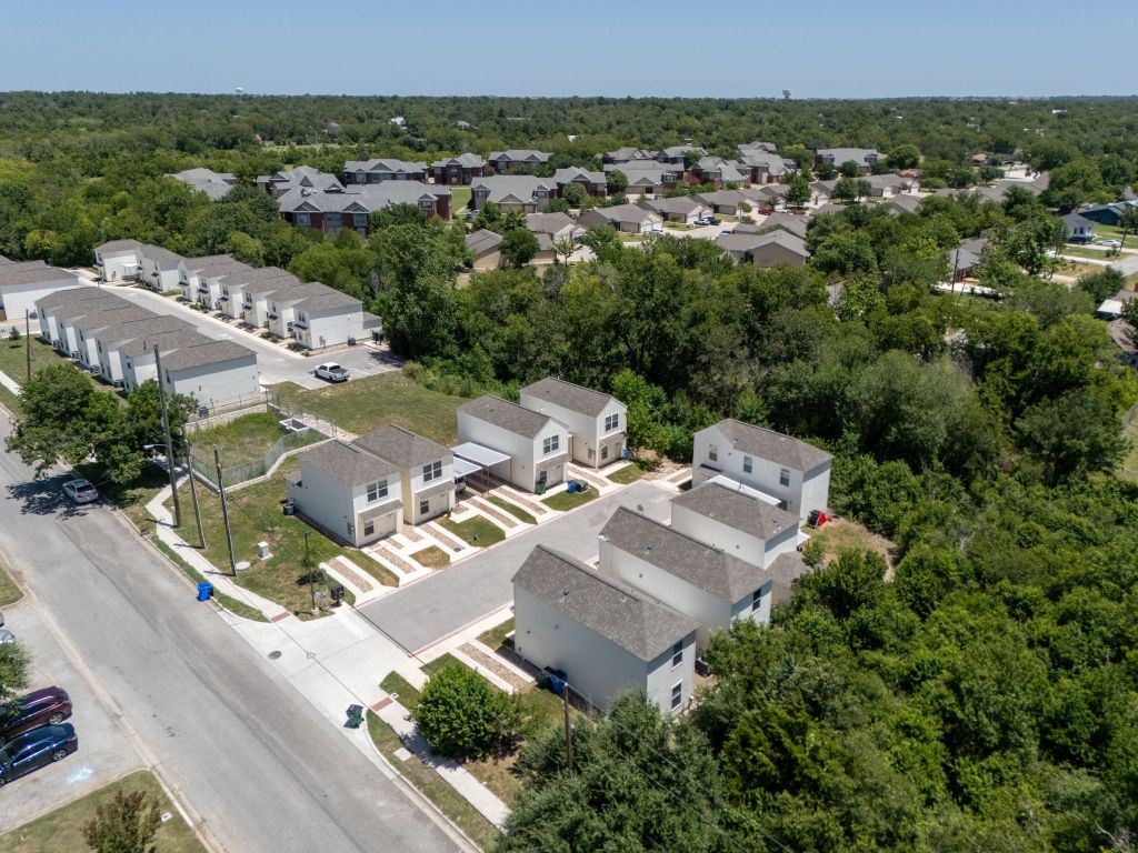 230 Debus Drive, Unit 101B Taylor, TX 76574 - Photo 5 of 15 an aerial view of a house with a garden