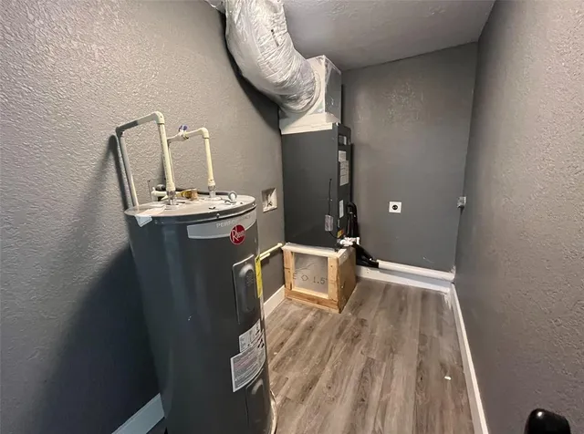 a view of a livingroom with wooden floor