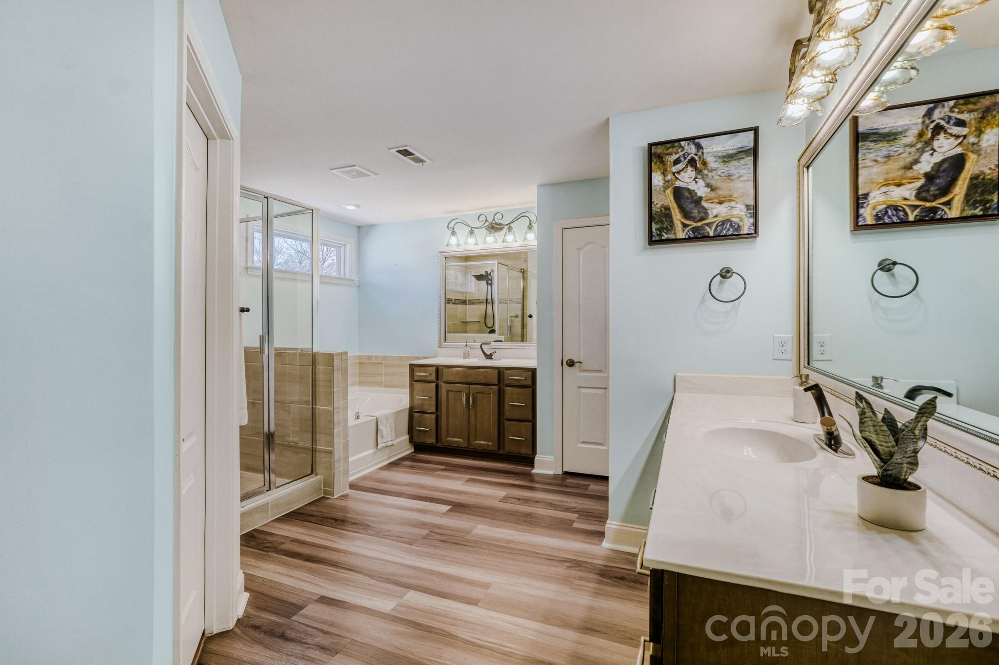 1318 Poppy Way Matthews, NC 28104 - Photo 18 of 33 a kitchen with stainless steel appliances granite countertop a refrigerator and a sink