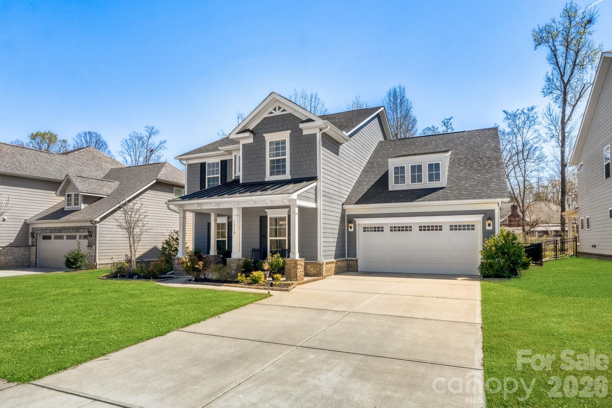1318 Poppy Way Matthews, NC 28104 - Photo 29 of 33 a front view of house with yard and green space