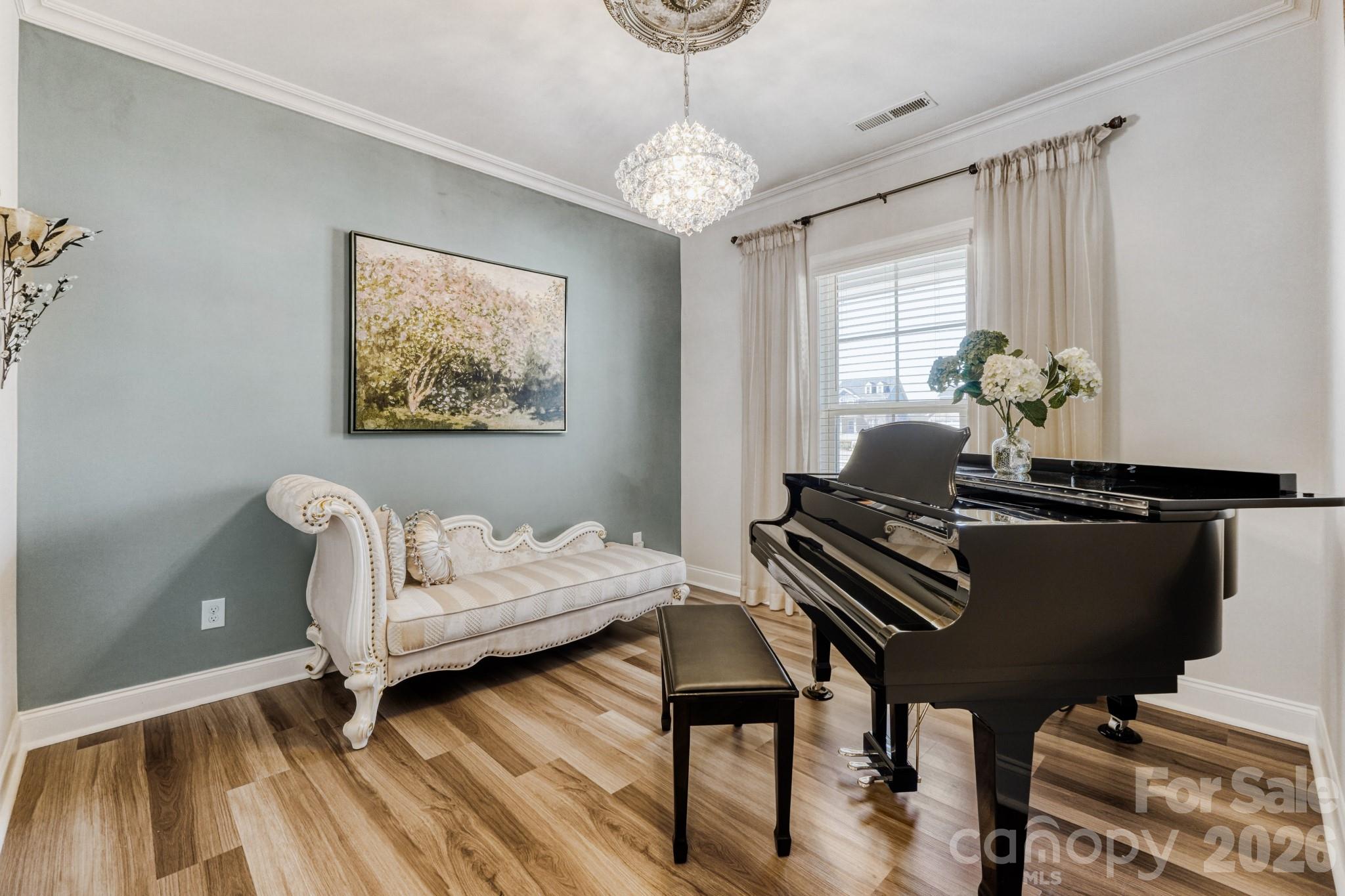 1318 Poppy Way Matthews, NC 28104 - Photo 4 of 33 a living room with furniture and a window