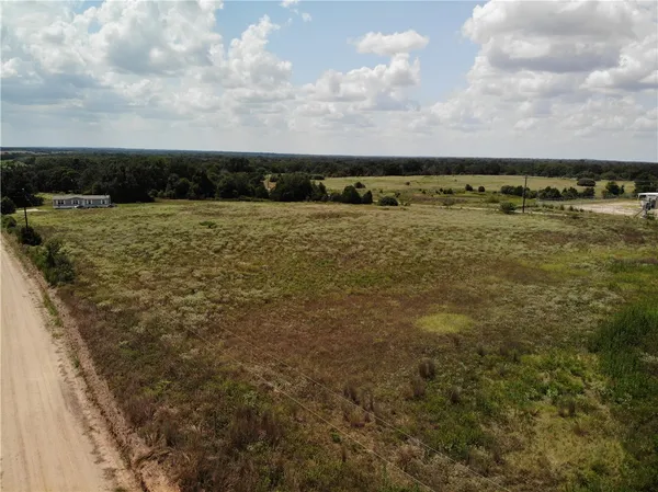 a view of a field with sky view