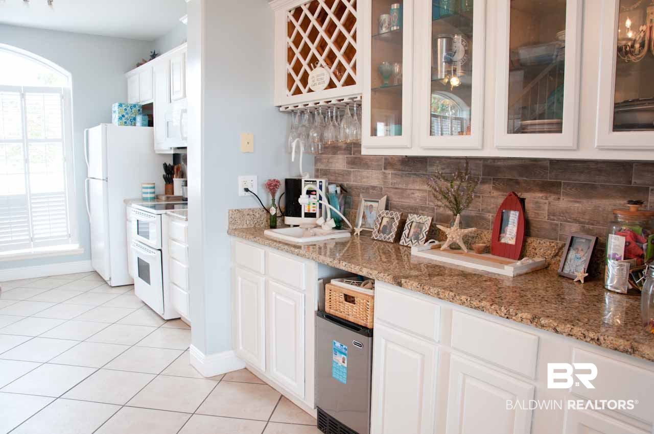 27152 Marina Road, Unit B Orange Beach, AL 36561 - Photo 11 of 37 Granite Counters, Tile Floors