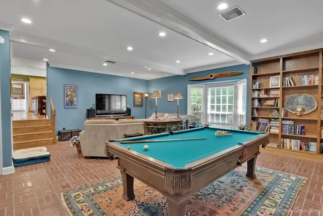a view of a living room and dining room