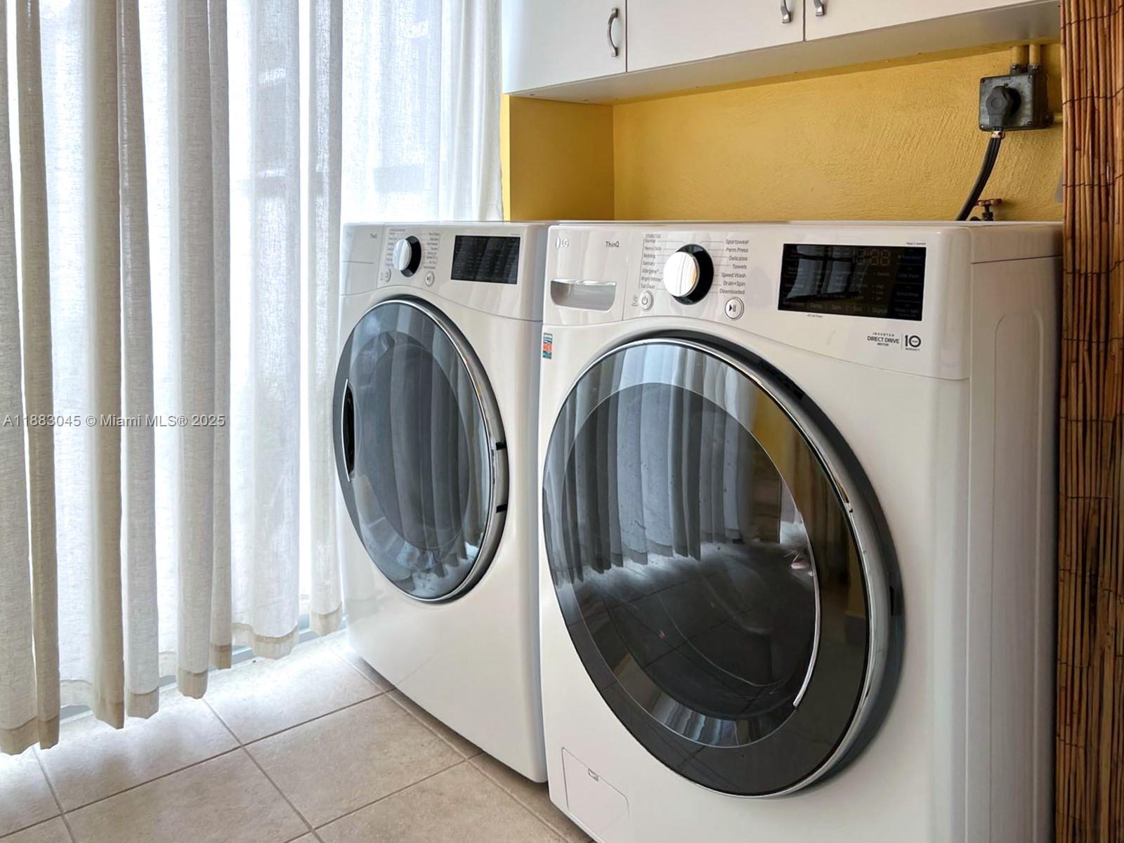 230 Beverly Road West Palm Beach, FL 33405 - Photo 31 of 47 a utility room with dryer and washer