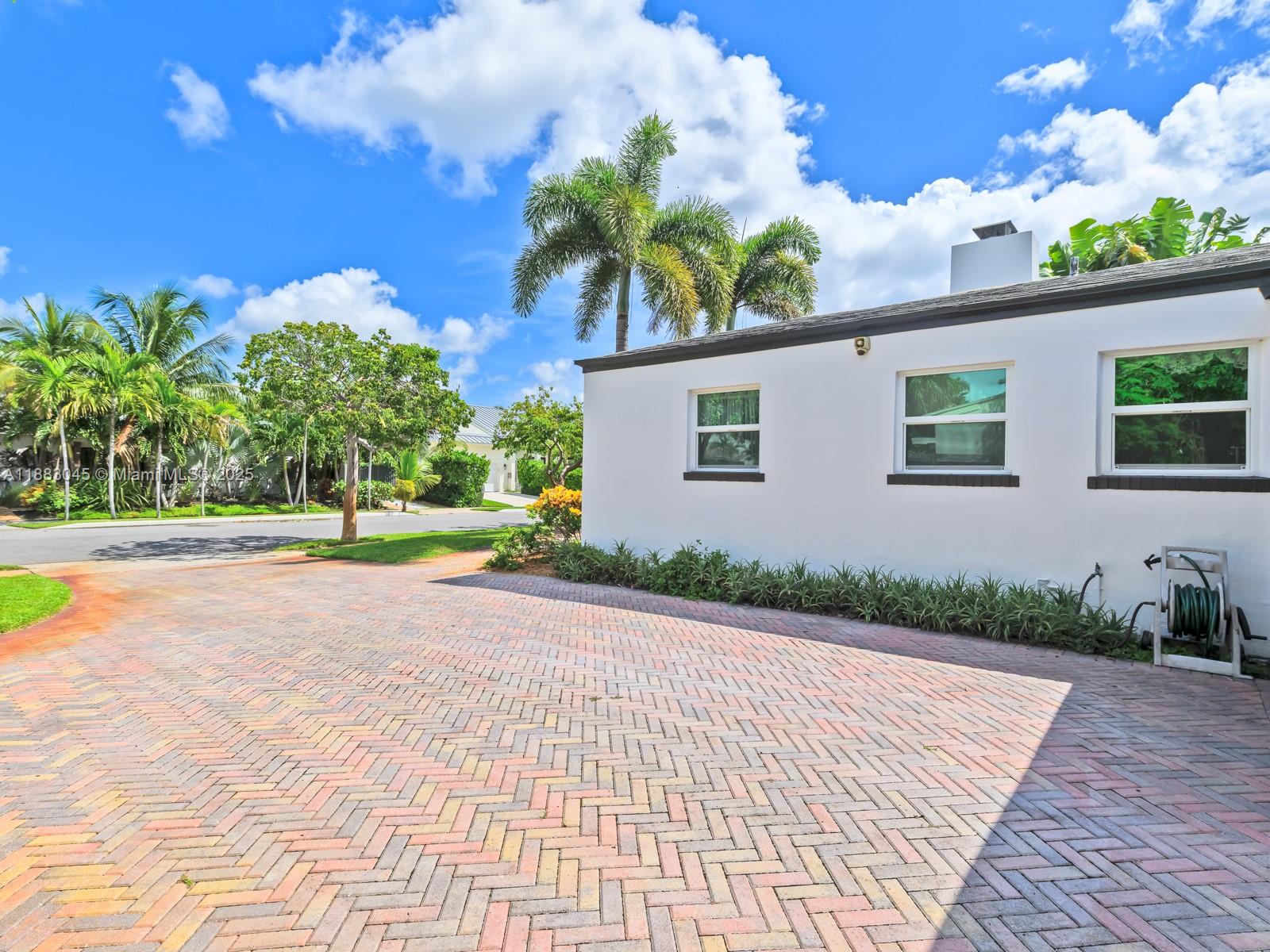 230 Beverly Road West Palm Beach, FL 33405 - Photo 36 of 47 a front view of a house with garden