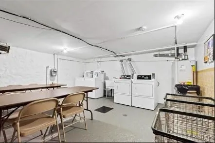 a utility room with cabinets