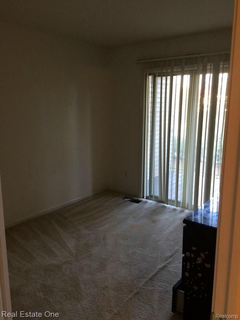 4306 Schaefer Road Dearborn, MI 48126 - Photo 8 of 10 bedroom two with walkout patio