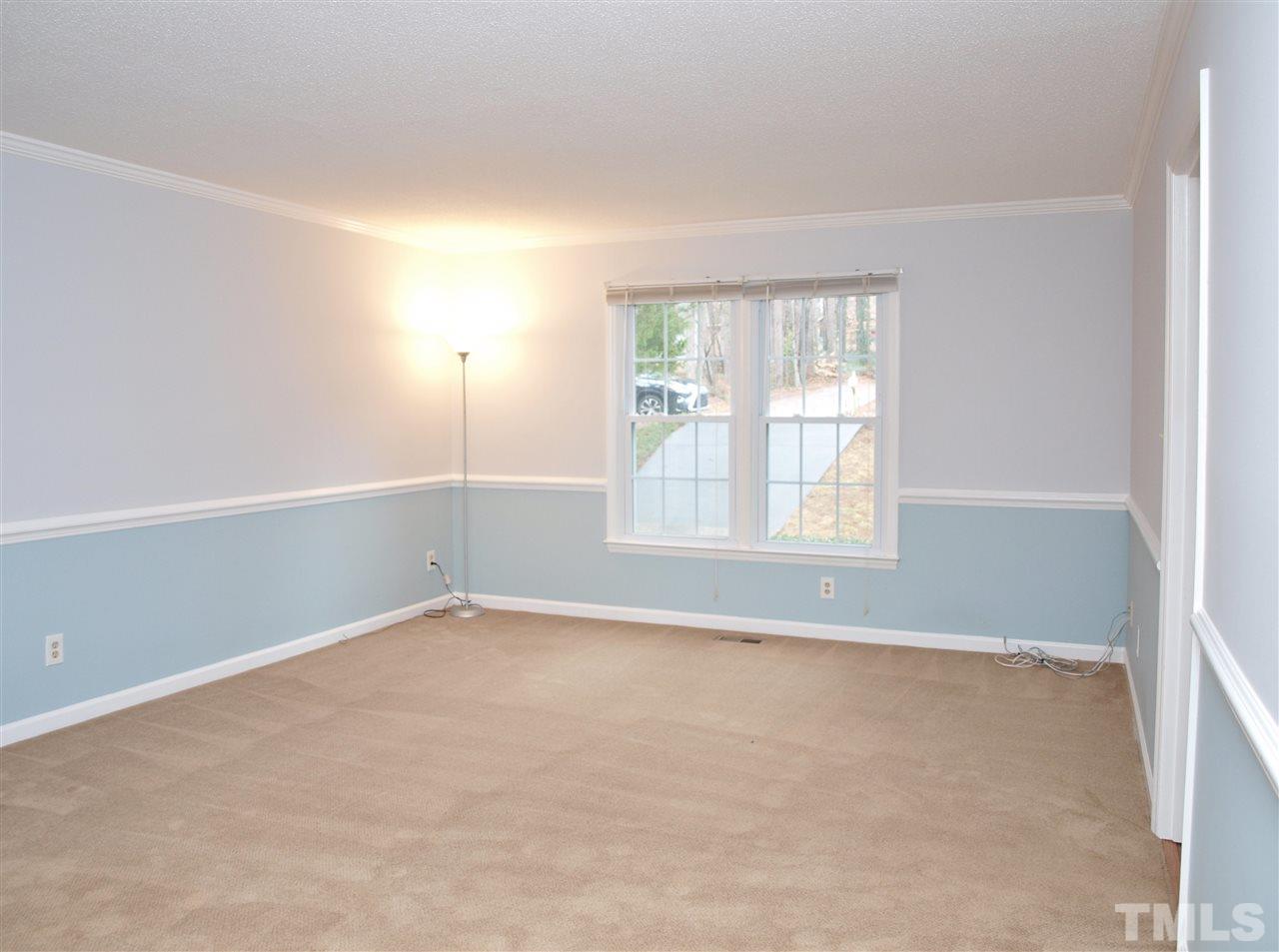 1117 Toppe Ridge Court Raleigh, NC 27615 - Photo 11 of 30 an empty room with windows