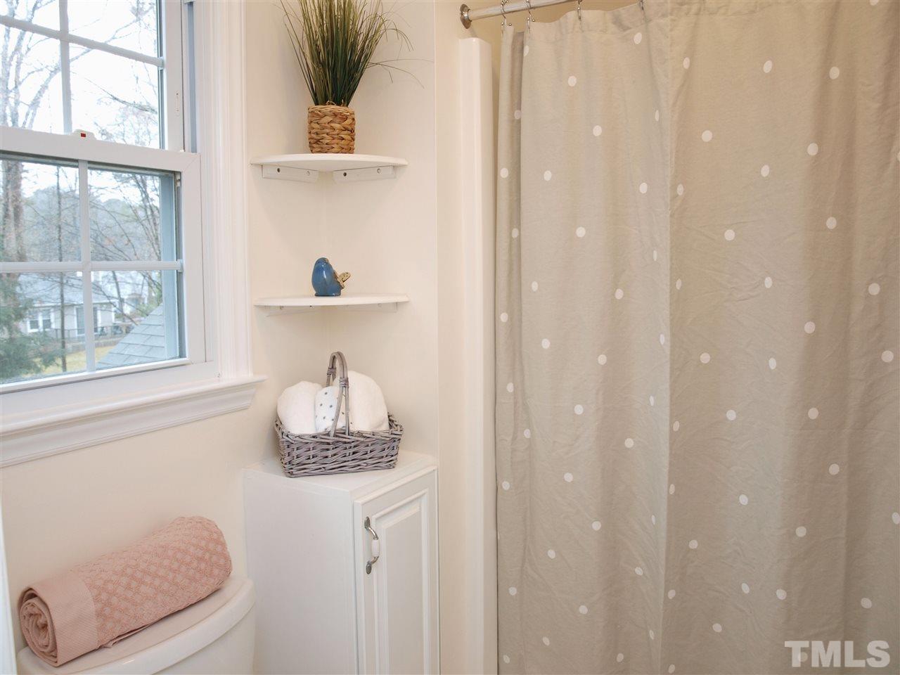 1117 Toppe Ridge Court Raleigh, NC 27615 - Photo 16 of 30 a bathroom with a shower