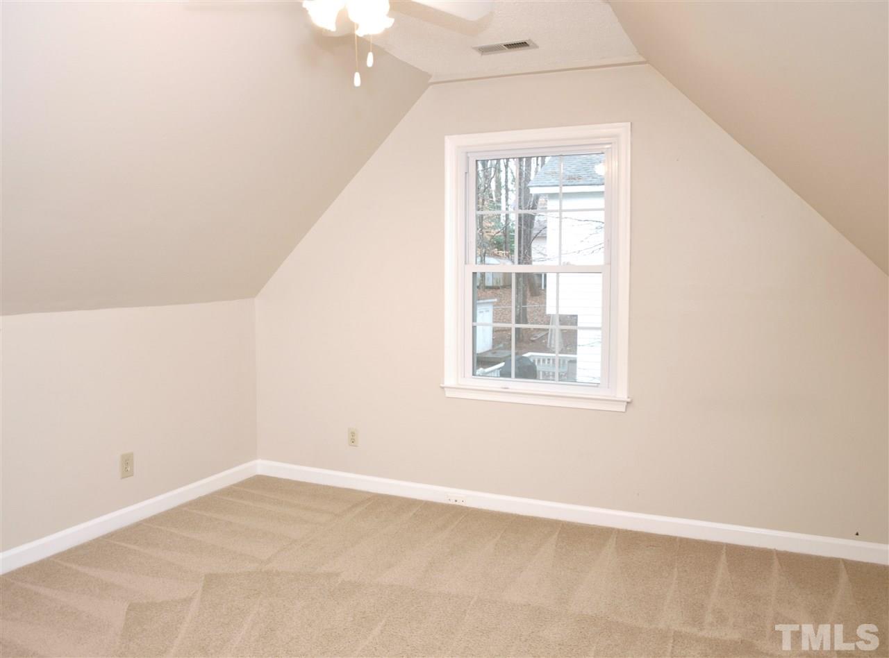 1117 Toppe Ridge Court Raleigh, NC 27615 - Photo 17 of 30 an empty room with a window