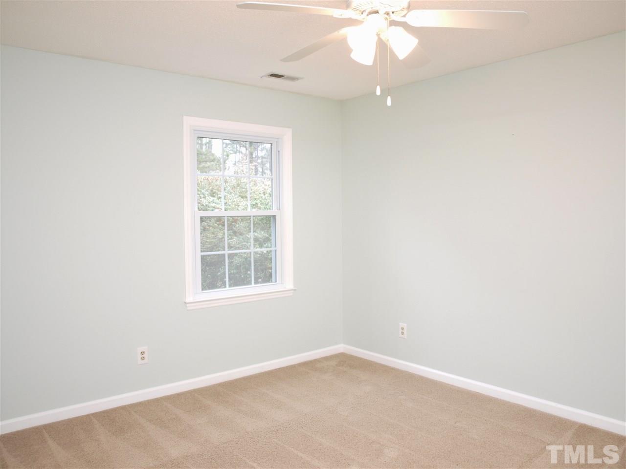 1117 Toppe Ridge Court Raleigh, NC 27615 - Photo 19 of 30 an empty room with a window
