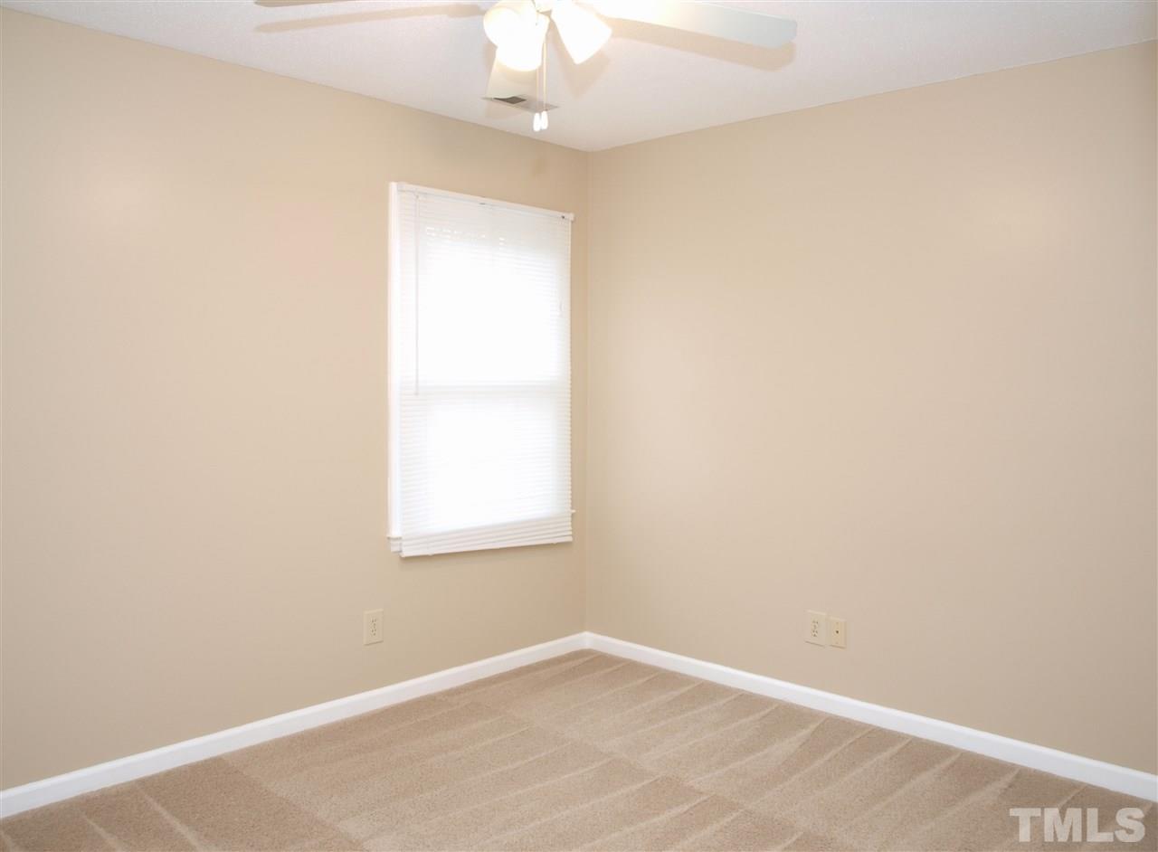 1117 Toppe Ridge Court Raleigh, NC 27615 - Photo 21 of 30 an empty room with a window