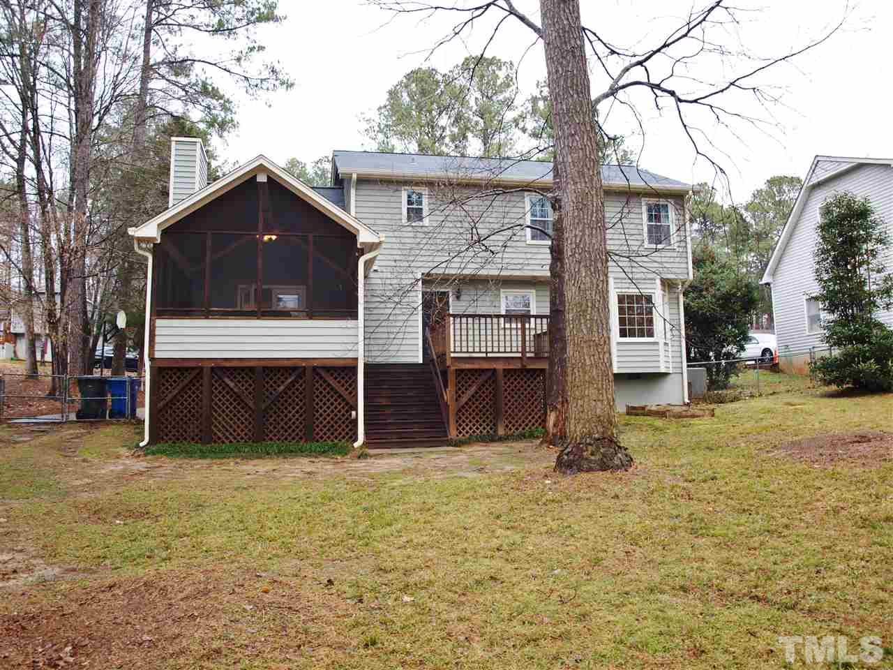 1117 Toppe Ridge Court Raleigh, NC 27615 - Photo 28 of 30 a house with a yard