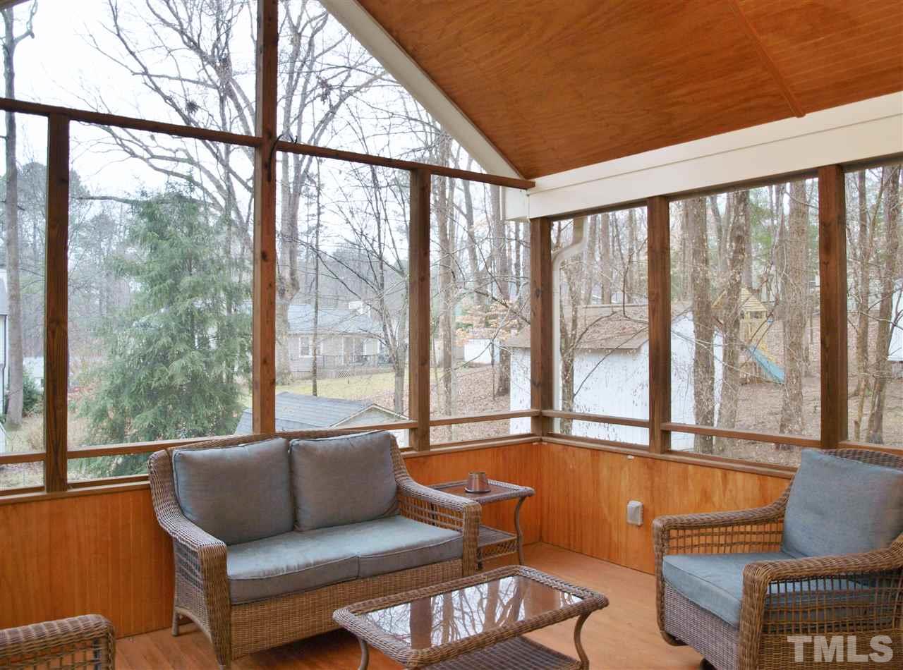 1117 Toppe Ridge Court Raleigh, NC 27615 - Photo 30 of 30 a living room with furniture and a large window
