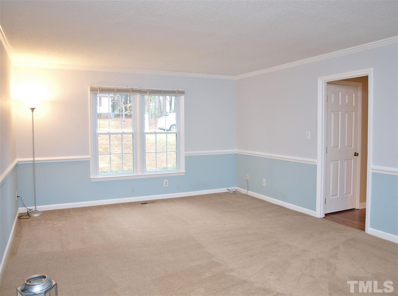 1117 Toppe Ridge Court Raleigh, NC 27615 - Photo 10 of 30 an empty room with windows