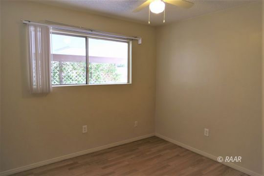 440 Debra Lane Ridgecrest, CA 93555 - Photo 22 of 32 an empty room with a window