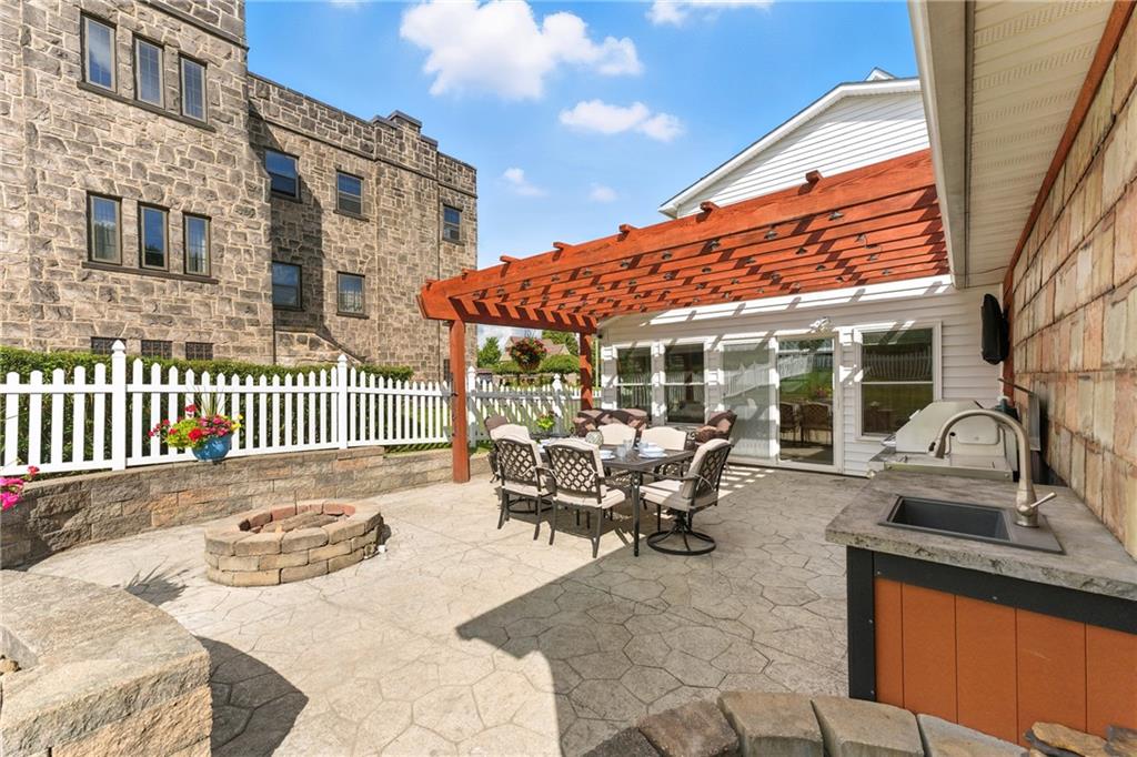 519 West Ridge Avenue Sharpsville, PA 16150 - Photo 38 of 48 a view of a patio with couches table and chairs and potted plants