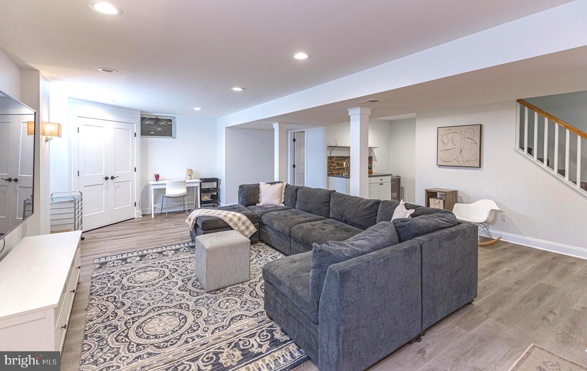 1709 Freeland Road Freeland, MD 21053 - Photo 54 of 65 a living room with furniture and a rug