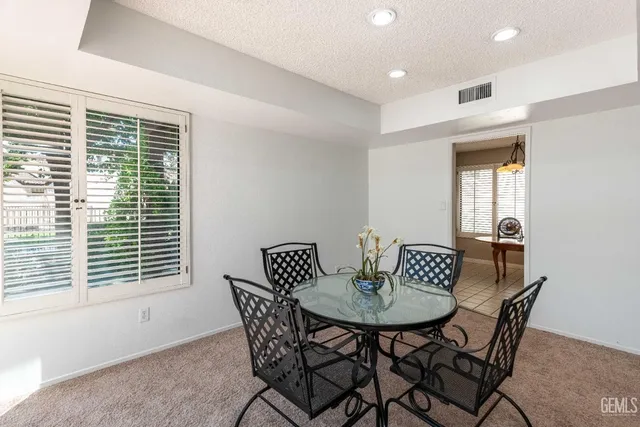 a kitchen with counter top space and appliances