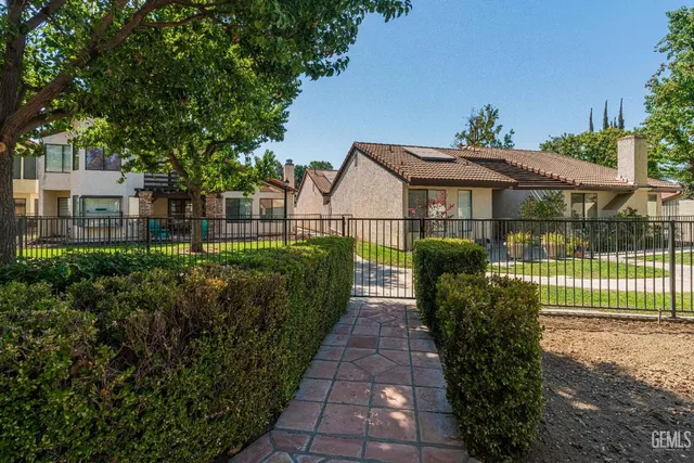 a view of a garden with a pathway
