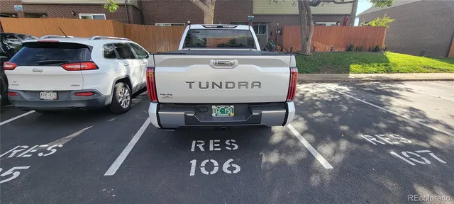 a view of a street with parking