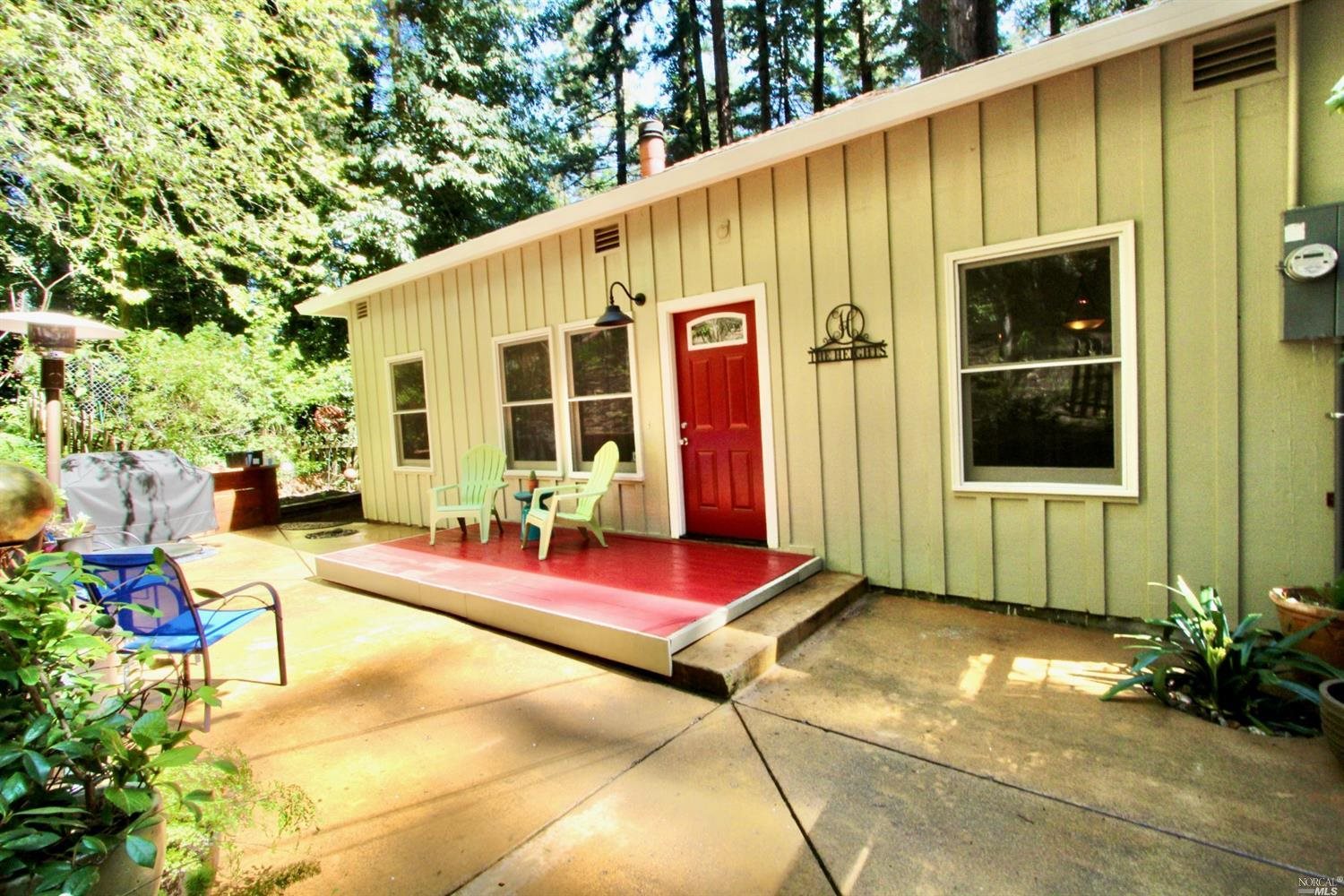 18155 Old Monte Rio Road Guerneville, CA 95446 - Photo 1 of 1 Sunny front patio with views all around.