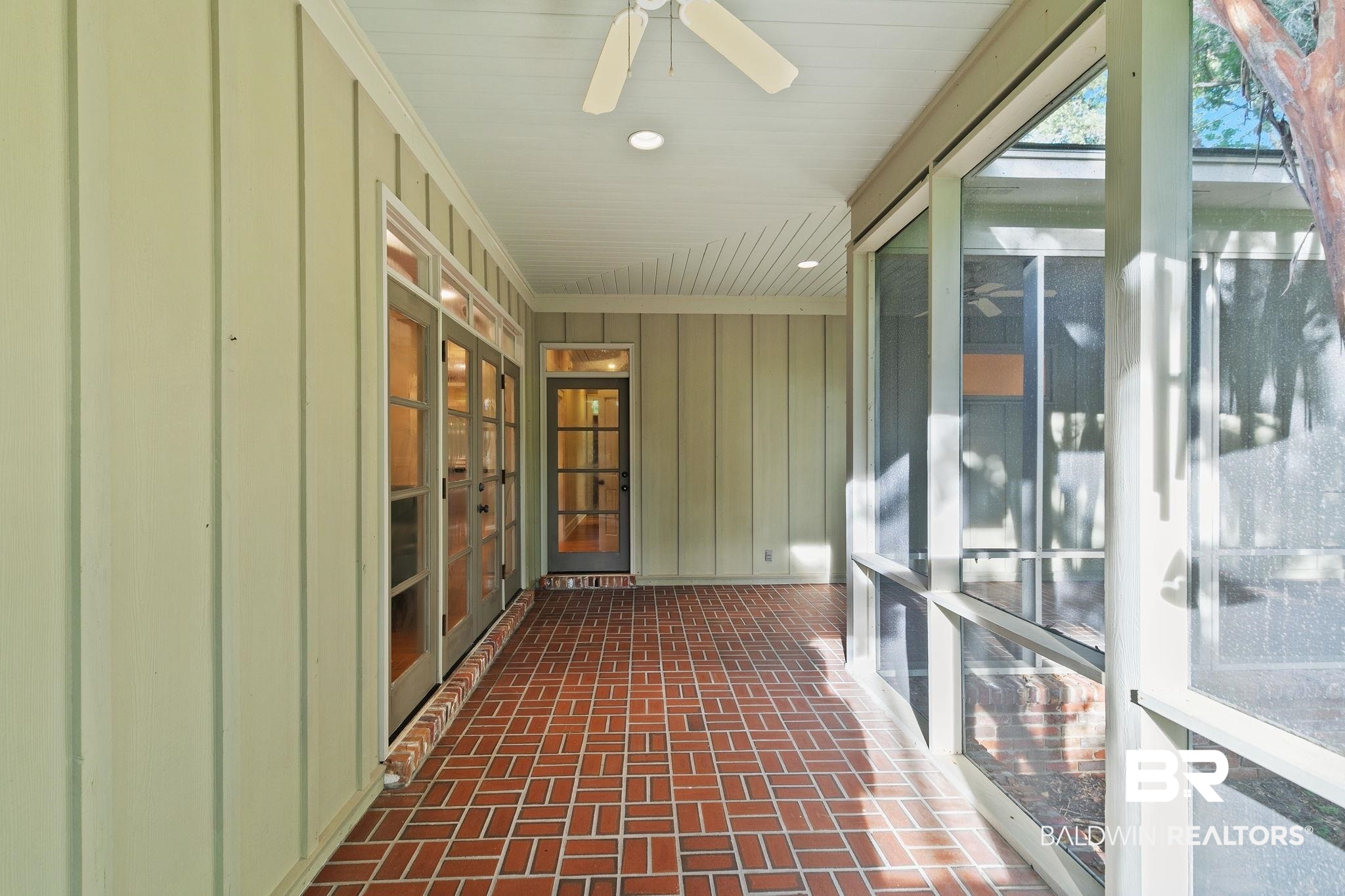 202 Beall Lane Daphne, AL 36526 - Photo 32 of 46 Unfurnished sunroom featuring ceiling fan