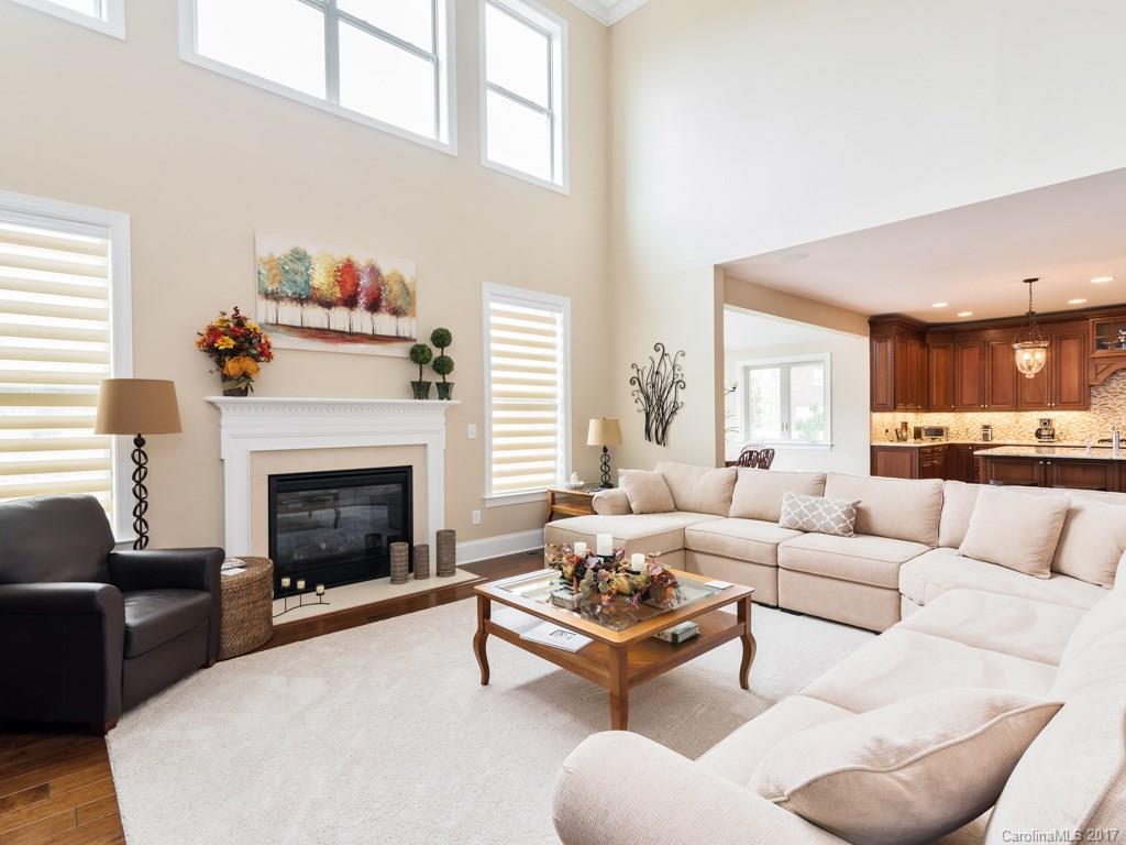 7005 Tea Olive Road Marvin, NC 28173 - Photo 2 of 24 a living room with furniture and a fireplace