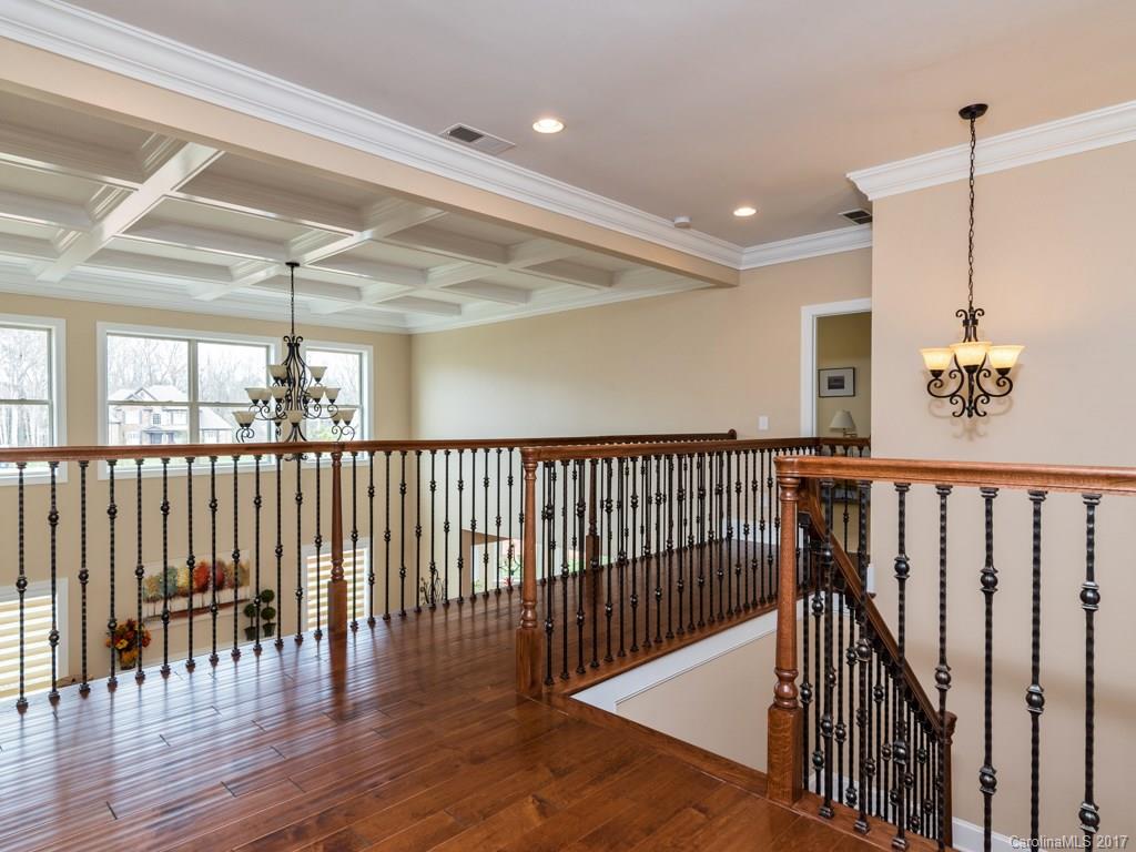 7005 Tea Olive Road Marvin, NC 28173 - Photo 15 of 24 a view of a hallway with wooden floor