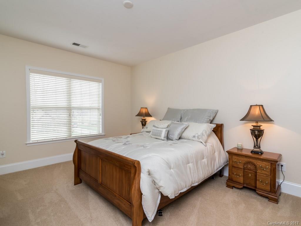 7005 Tea Olive Road Marvin, NC 28173 - Photo 19 of 24 a bedroom with a bed and a window