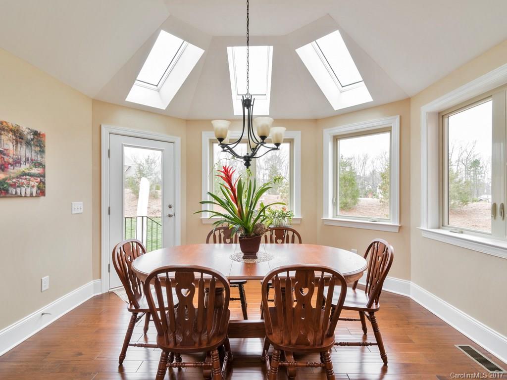 7005 Tea Olive Road Marvin, NC 28173 - Photo 5 of 24 a view of a dining room with furniture window and outside view