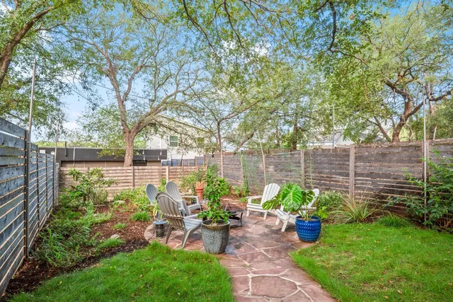 a garden view with a seating space