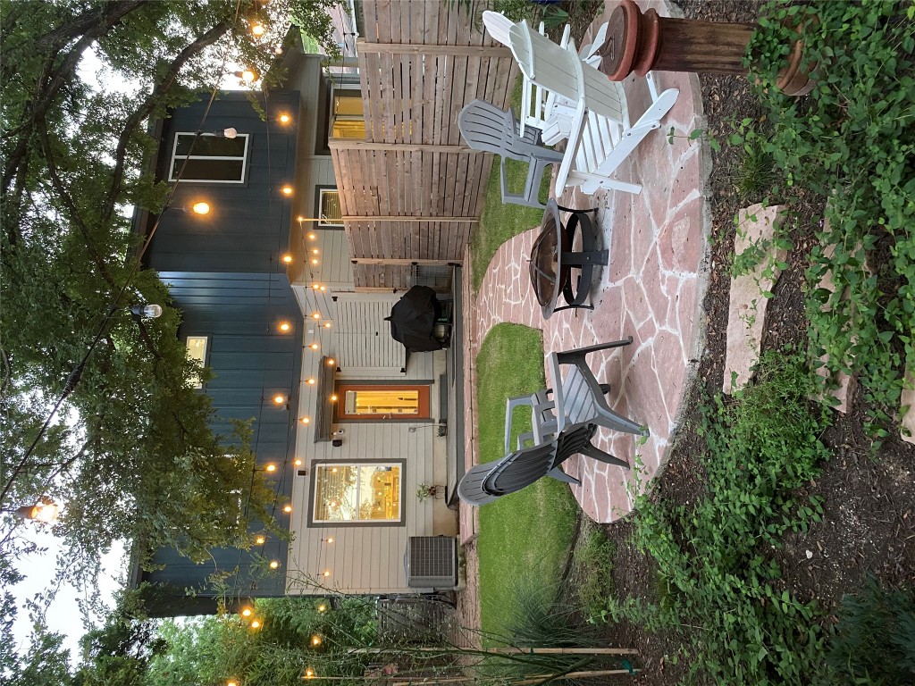 1220 Delano Street, Unit B Austin, TX 78721 - Photo 24 of 24 a view of a backyard with sitting area and furniture