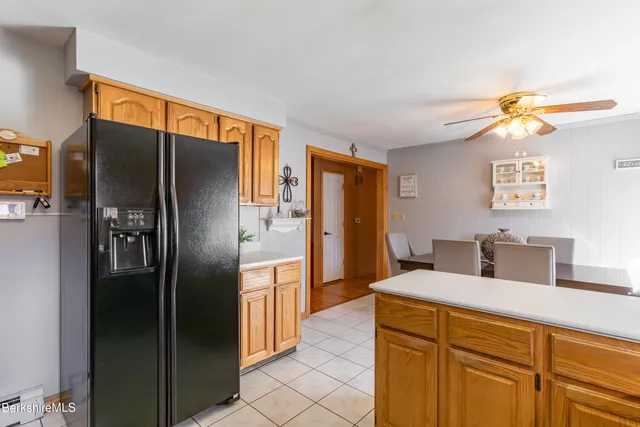 a kitchen with stainless steel appliances a refrigerator and a sink