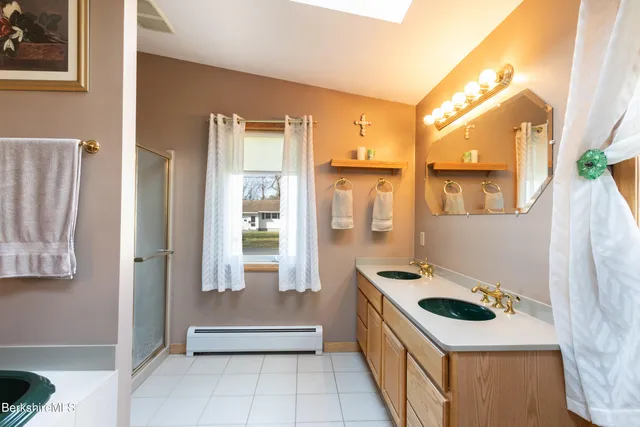 a kitchen with a sink and a stove top oven