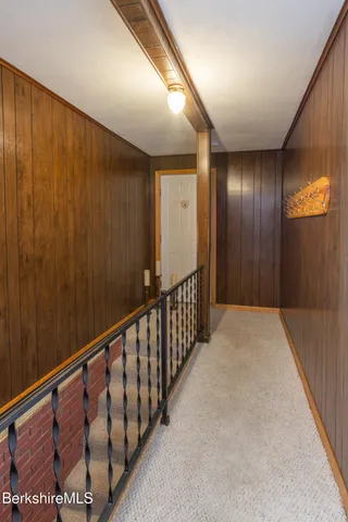 a view of hallway with stairs