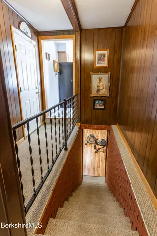a view of hallway with stairs