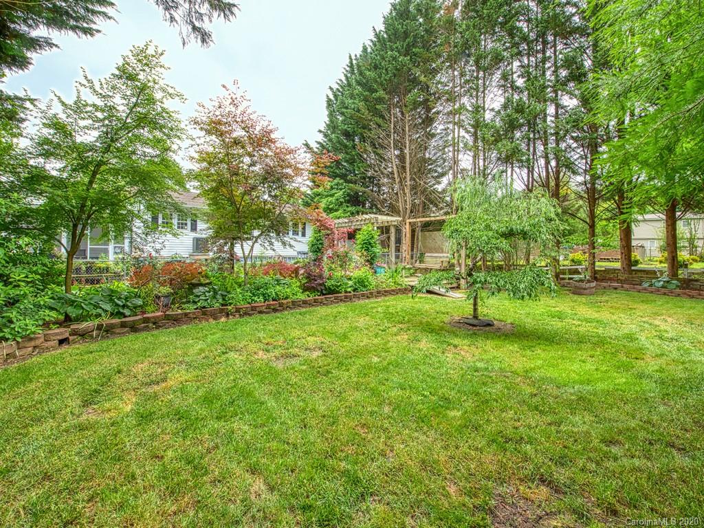 154 Camp Branch Road Waynesville, NC 28786 - Photo 14 of 29 a view of house with a backyard