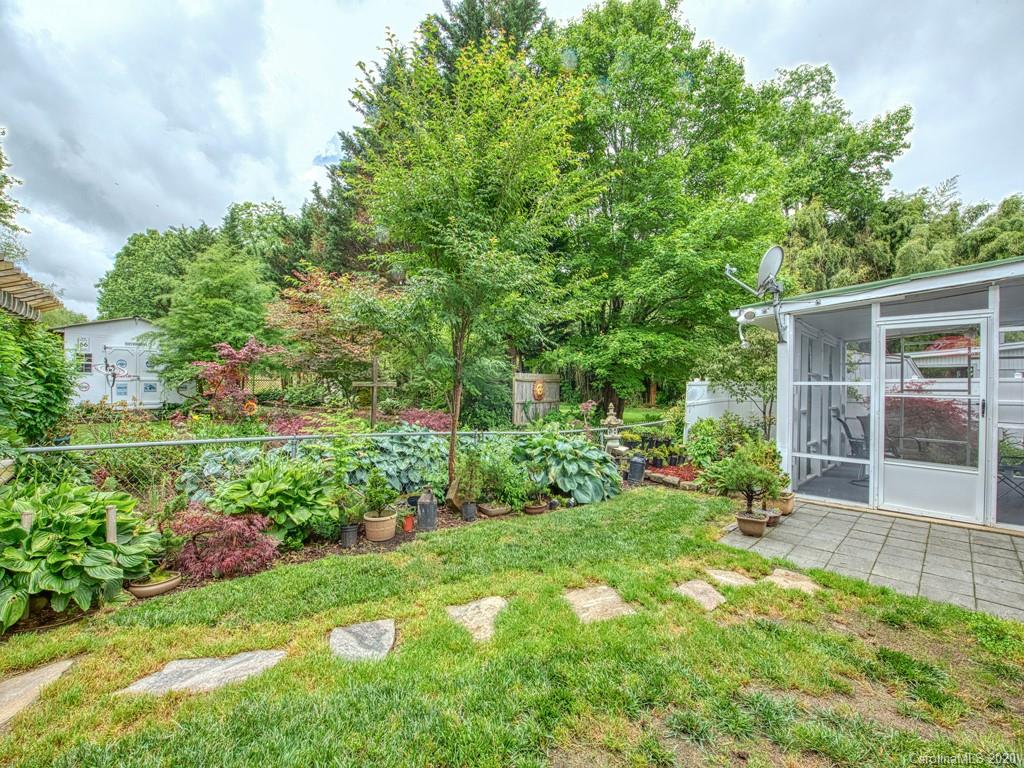 154 Camp Branch Road Waynesville, NC 28786 - Photo 8 of 29 a view of a backyard with garden