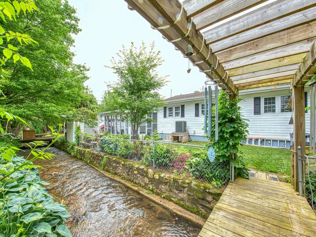 154 Camp Branch Road Waynesville, NC 28786 - Photo 10 of 29 a view of a house with a yard
