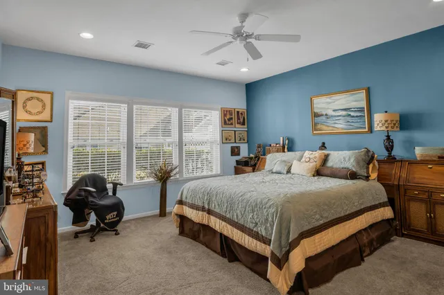 a bed room with a bed and a couch