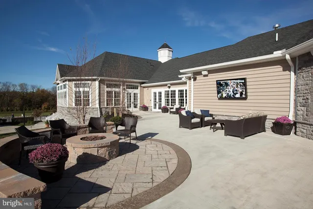 a outdoor space with patio furniture and a potted plant