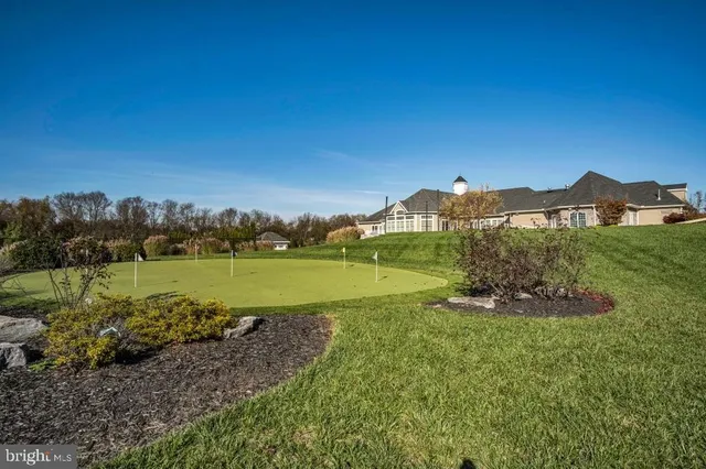 a view of a lake with a yard